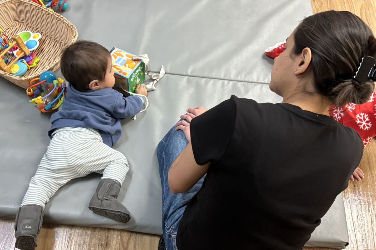 photo of ecs student and baby